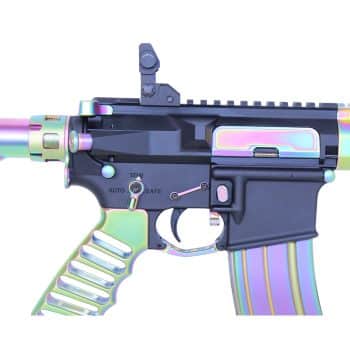 a multicolored gun with a gun clipping out of it