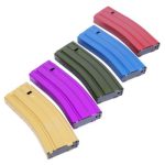 a set of four magazines with different colors