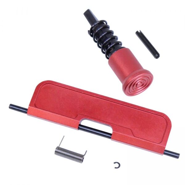 a red tool with a black handle and a screwdriver