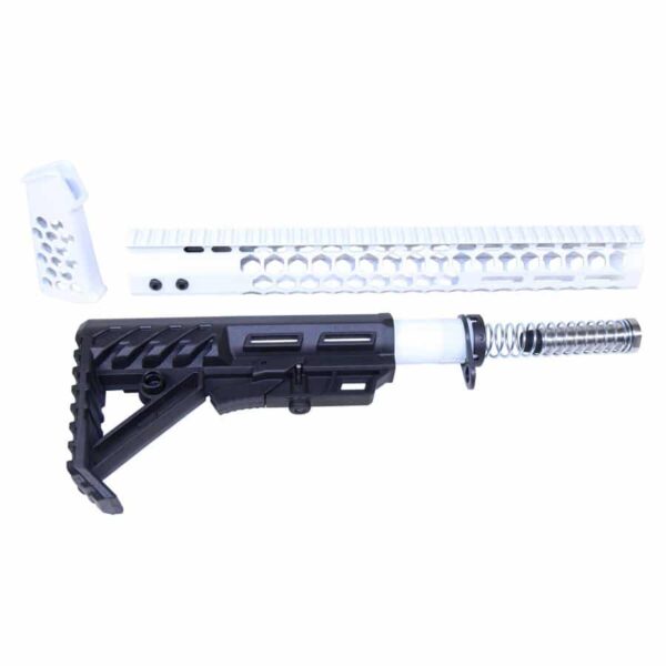 a white and black machine gun and a black and white machine gun