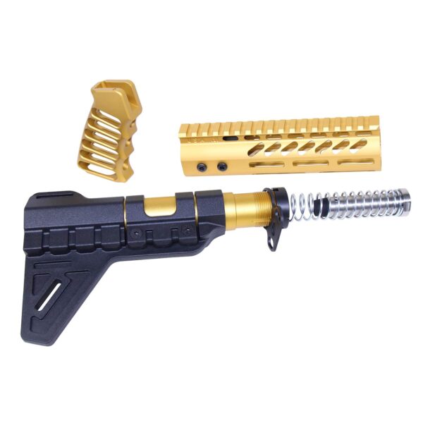 a gold and black rifle and a black and gold rifle