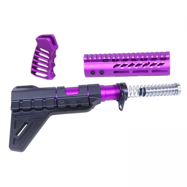 a purple and black rifle and a purple and silver rifle