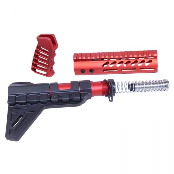 a red and black toy gun with a screwdriver