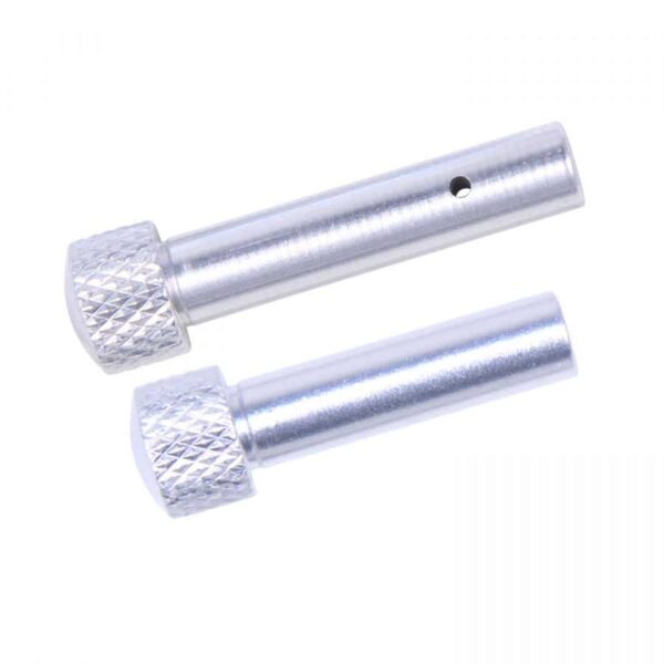 a pair of metal grips on a white background