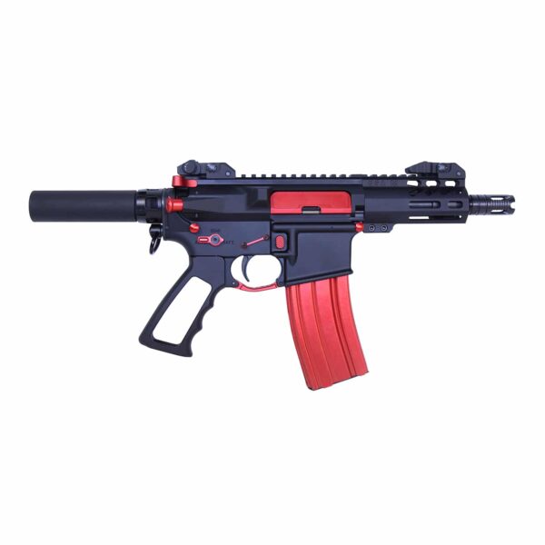 a toy gun with a red and black handle