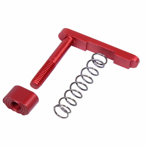 a red screw and spring on a white background