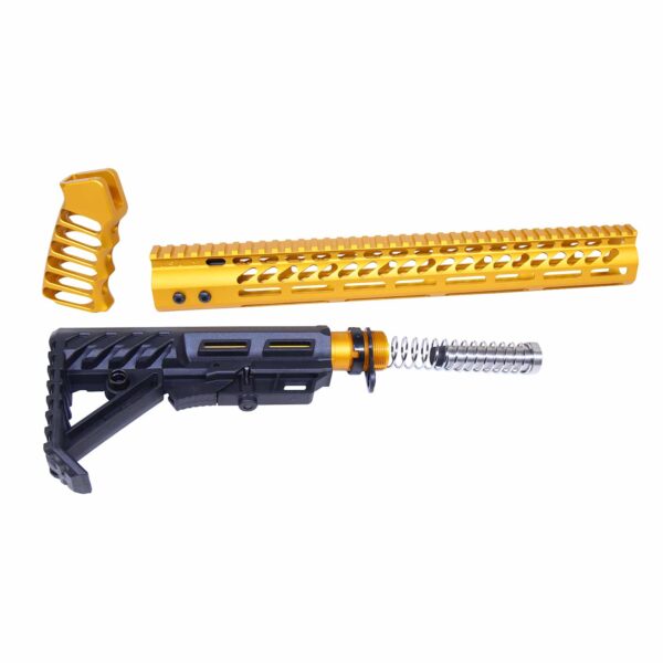 a yellow and black rifle and a gun