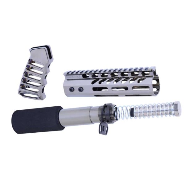 a close up of a knife and a tool on a white background