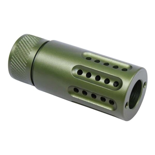 a green metal muzzle with holes on it