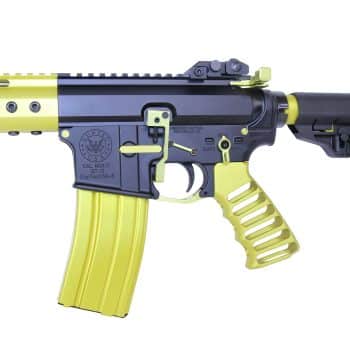 a toy gun with a yellow barrel and a black barrel