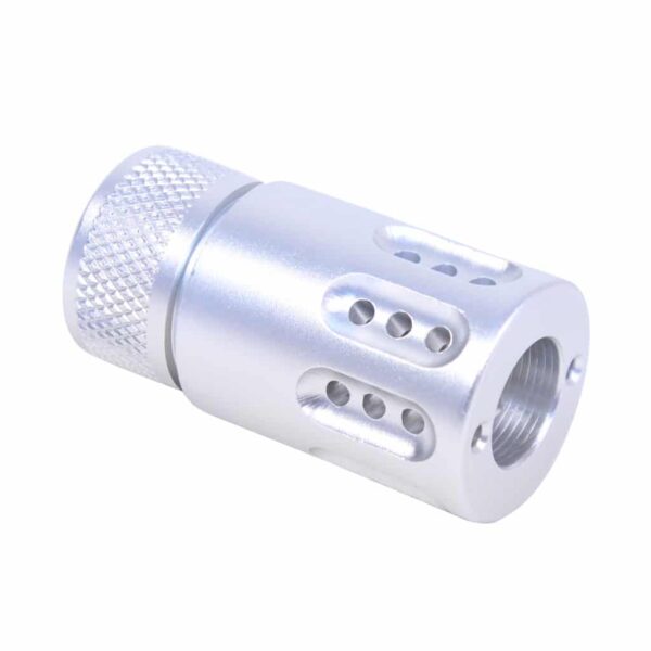 a white metal object with holes on it