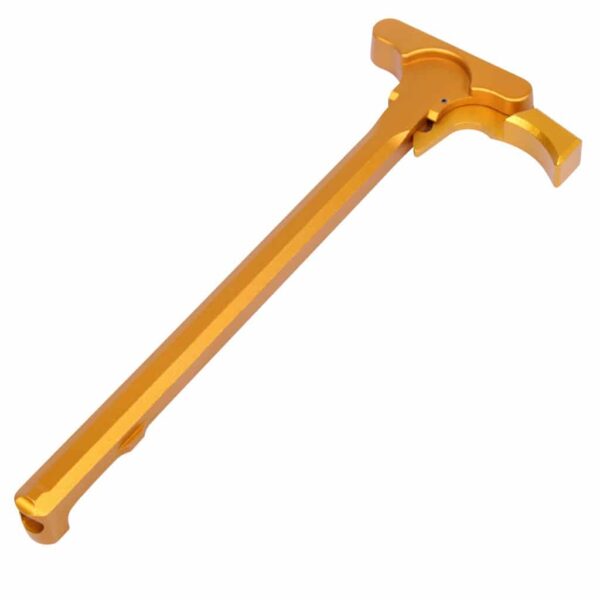 a golden metal key on a white background