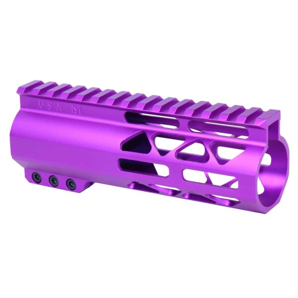 a purple aluminum muzzle for a rifle on a white background