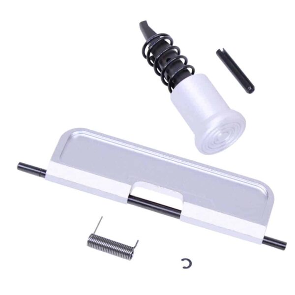 a white plastic object with screws and a screwdriver