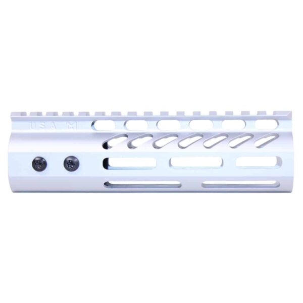 a close up of a white rifle rail