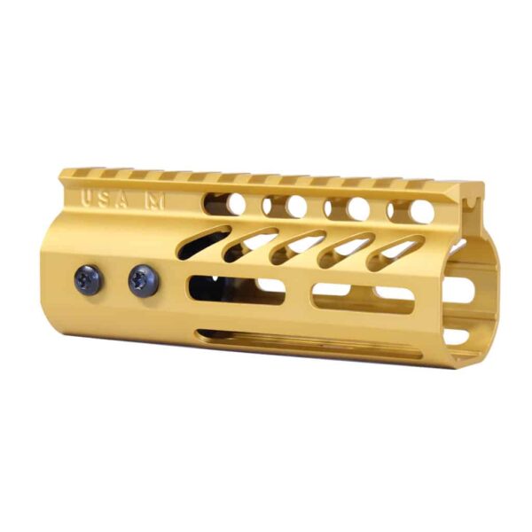 a gold metal tool holder for a rifle