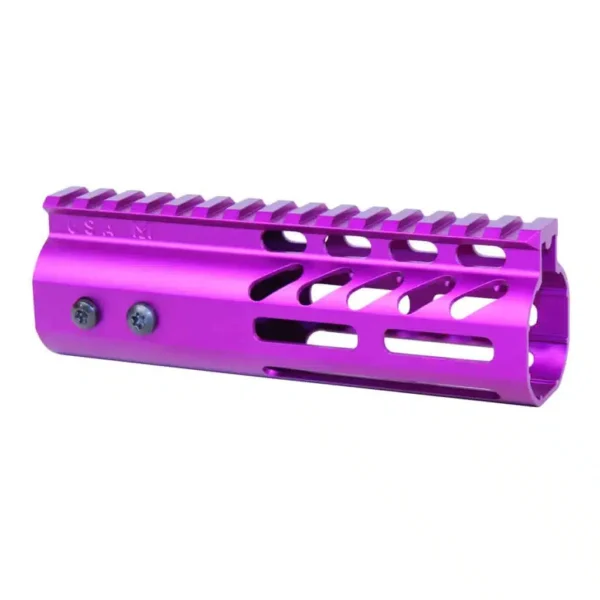 a purple aluminum muzzle for a rifle on a white background