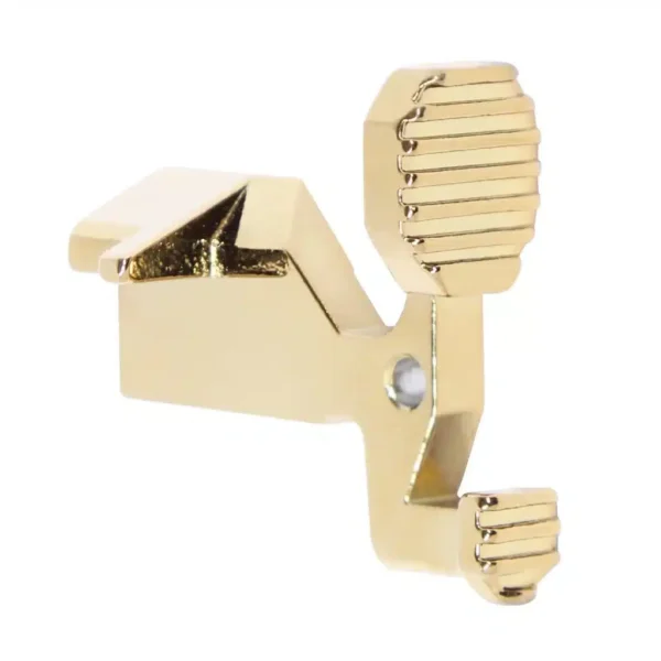 a pair of gold plated metal clips