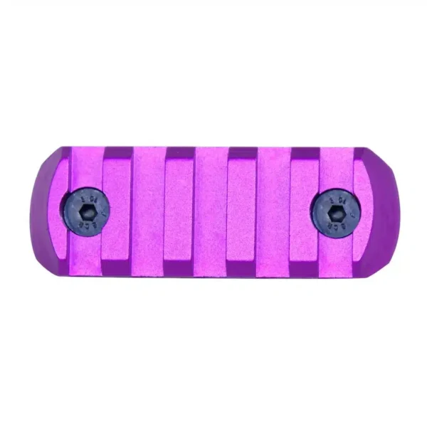 a purple skateboard with black wheels on a white background