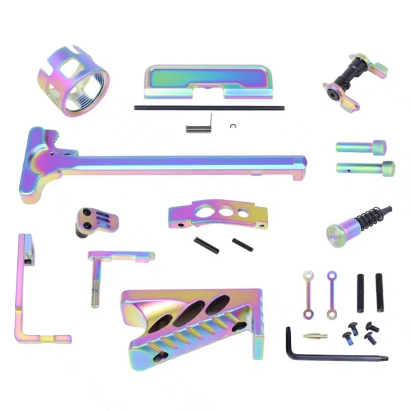 an assortment of metal parts and tools on a white background