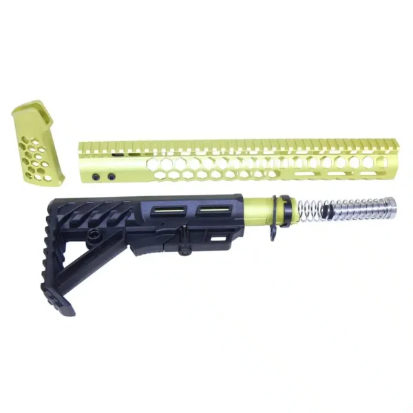 a yellow and black rifle with a flashlight