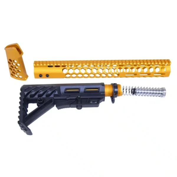 a yellow and black rifle with a screwdriver