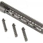 a set of screws and a handguard for a rifle