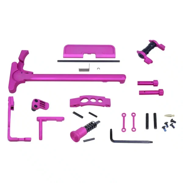 a pink plastic kit with tools and screws