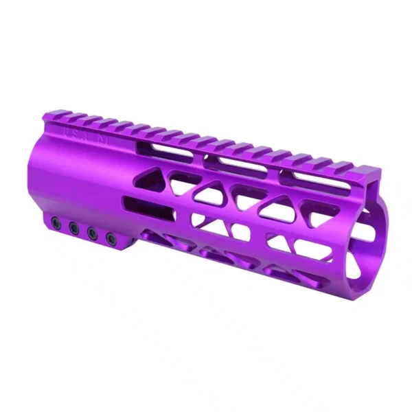 a purple plastic muzzle for a rifle on a white background