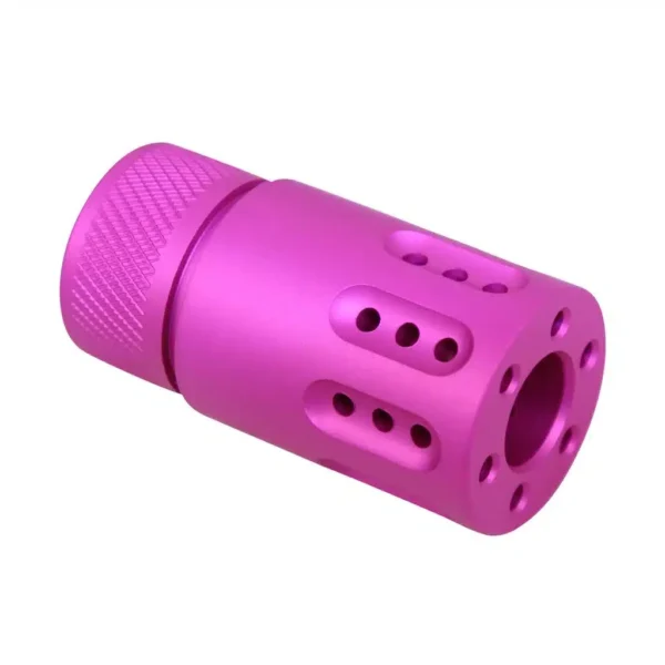 a pink plastic object on a white background