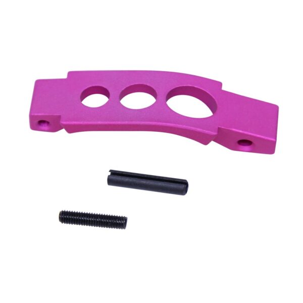 a pink plastic part with screws and a screwdriver