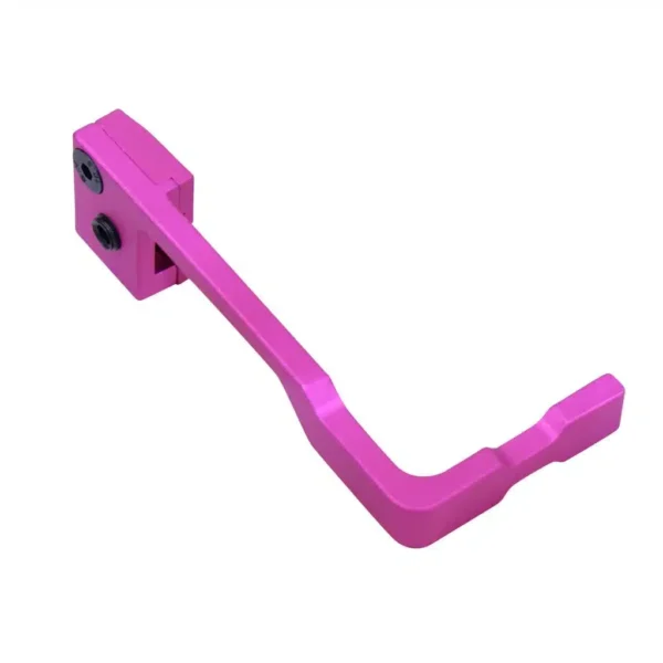 a pink plastic handle on a white background