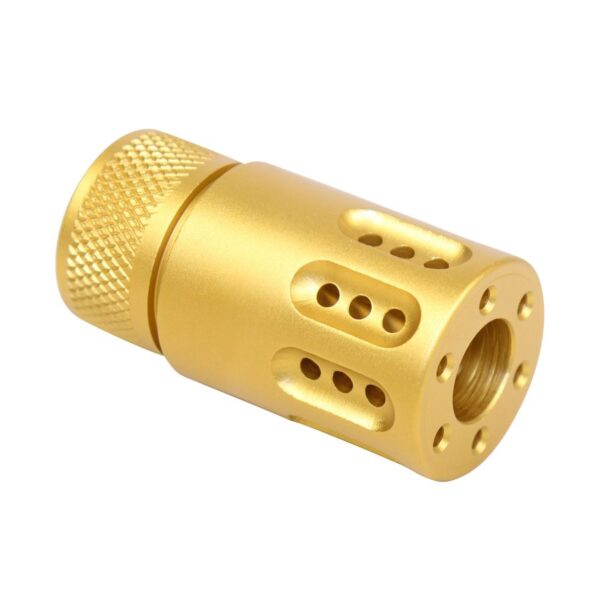 a gold colored metal object with holes