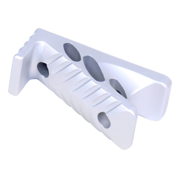 a white plastic object with holes in it