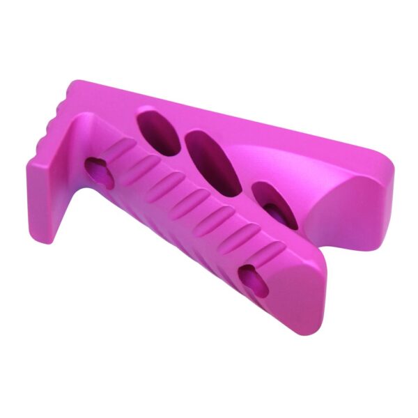 a pink plastic object on a white background