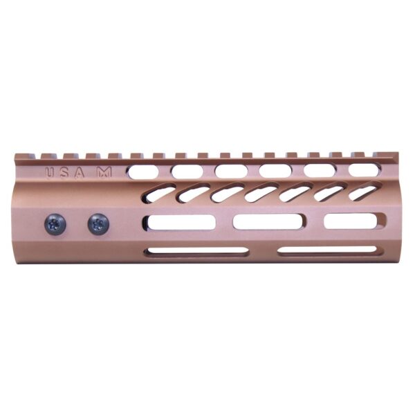 a pink rifle rail with holes on it