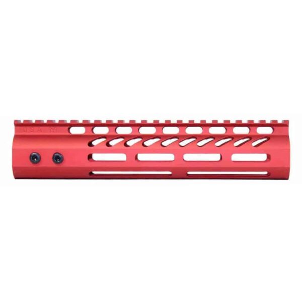 a red rifle rail with holes on it