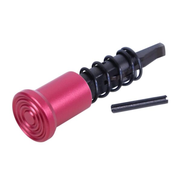 a red and black metal object with a screw