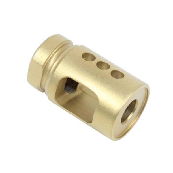 a brass colored metal object with four holes