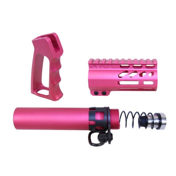 a pink rifle with a magnifizer and a hand guard