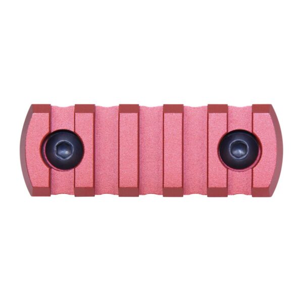 a pair of pink speakers sitting on top of each other