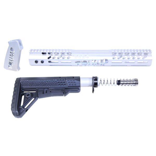 a toy gun and a remote control on a white background