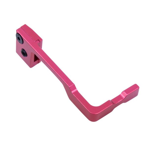 a pink handle for a camera on a white background