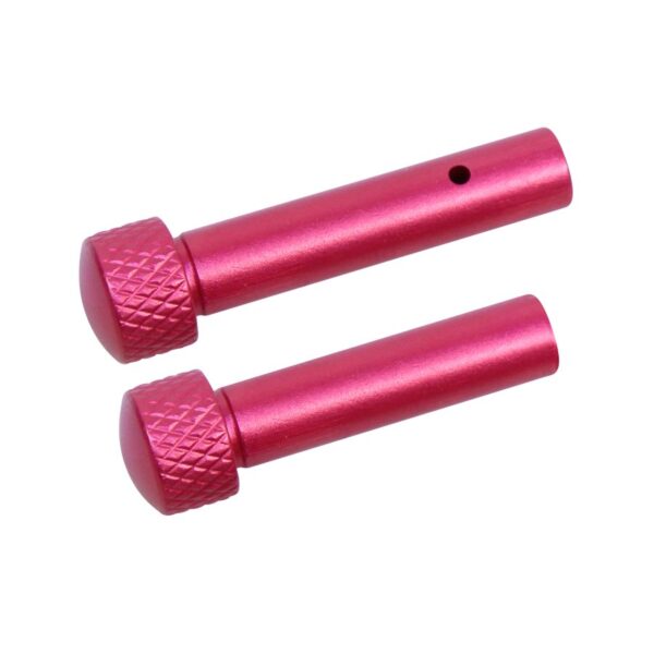 a pair of pink grips on a white background
