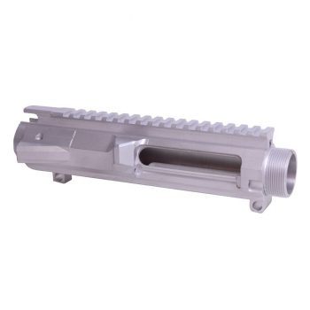 an aluminum muzzle for a rifle on a white background