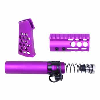 a set of purple parts for a gun
